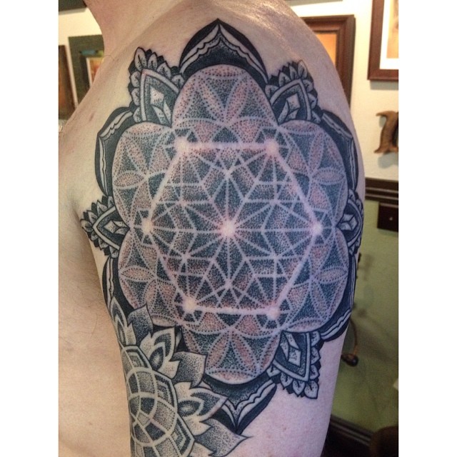 Mandala tattoo on left shoulder by Miah Waska