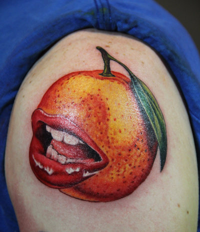 Orange Mouth Tattoo On Shoulder