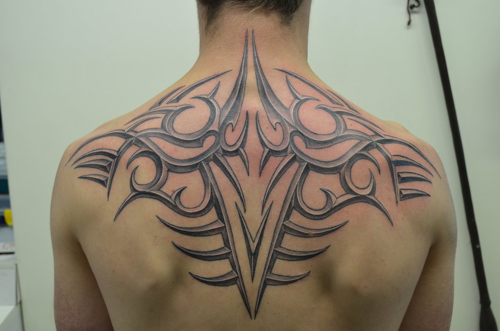 Ornament Tribal Tattoo On Upper Back by Zakknoir