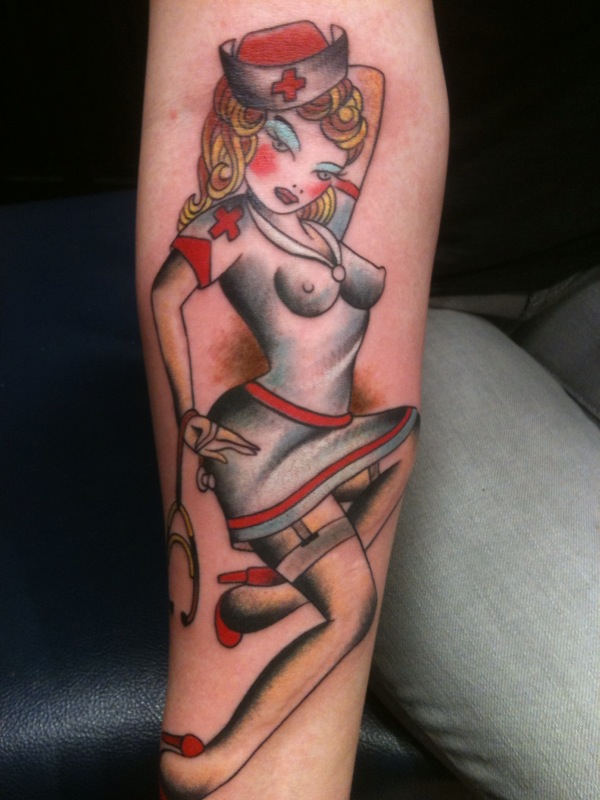 Pin Up Nurse Tattoo Design For Arm by Dave