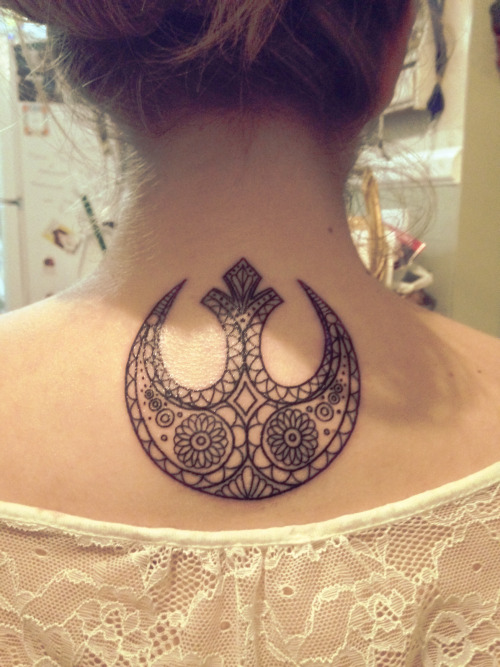 Rebel Alliance Tattoo On Girl Upper Back