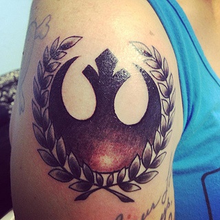 Rebel Alliance Tattoo On Right Shoulder