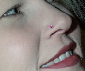 Right Nostril Piercing With Pink Stud