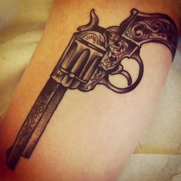 Traditional Grey Pistol Tattoo On Arm