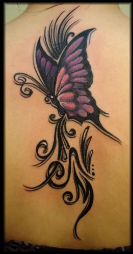 Tribal Mariposa Tattoo On Back Body