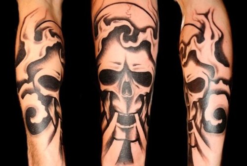 Amazing Skull With flames tattoo on forearm
