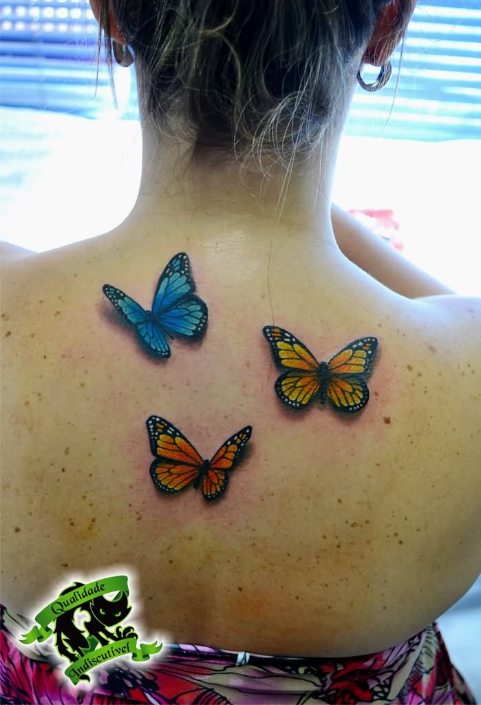 Colorful Butterflies tattoo on upper back