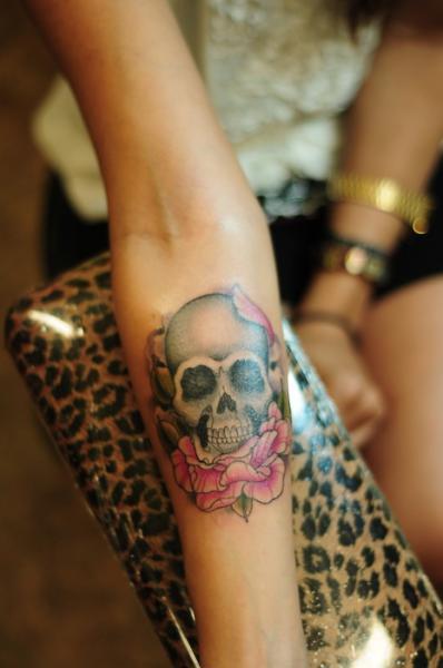 Cure Skull On Pink Flower Tattoo on Girl's Forearm