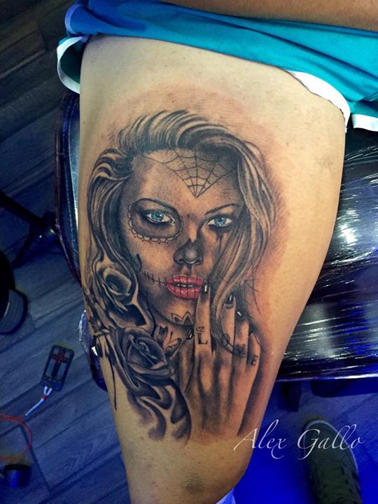 Girl's portrait tattoo on thigh by ALEX GALLO