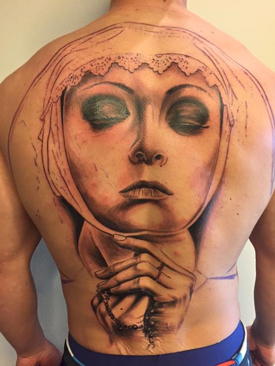 Praying nun's portrait tattoo on full back by Tattoo Mini - Full Niew