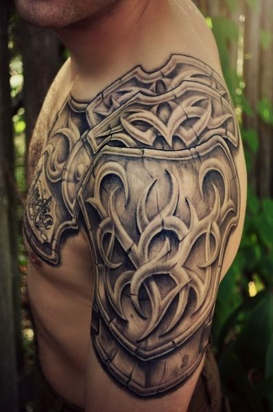 Realistic Armor Tattoo On Left Shoulder And Chest