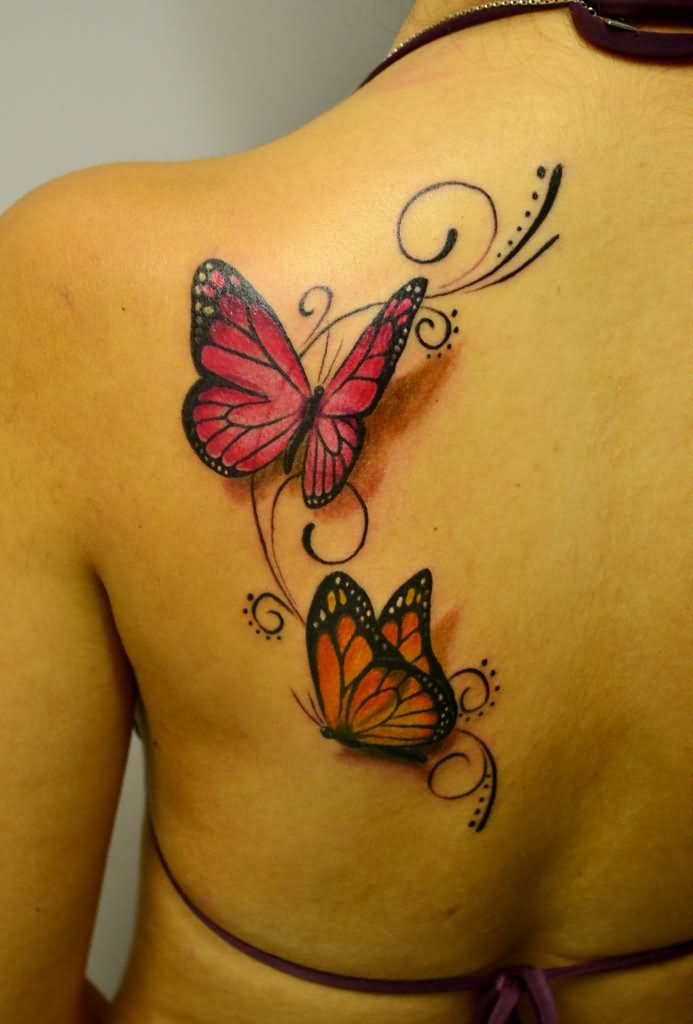 Realistic butterflies tattoo on left back