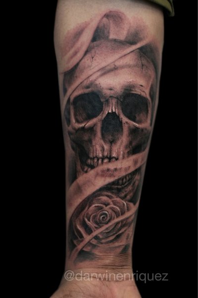 Skull & rose forearm tattoo