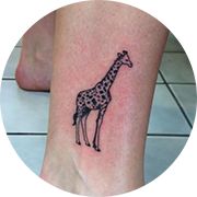 Small Giraffe Tattoo On Ankle