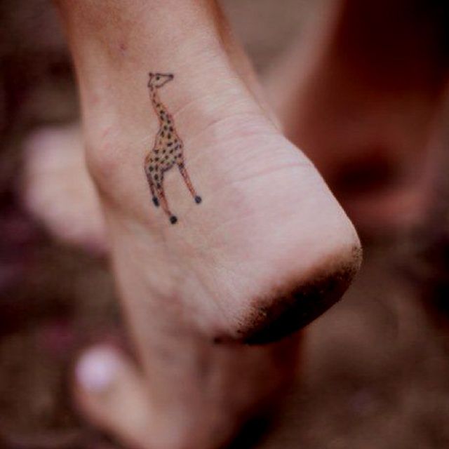 Small colorful Giraffe Tattoo on Ankle