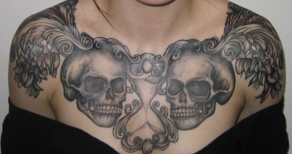 Amazing Hourglass With Skulls Tattoo On Check
