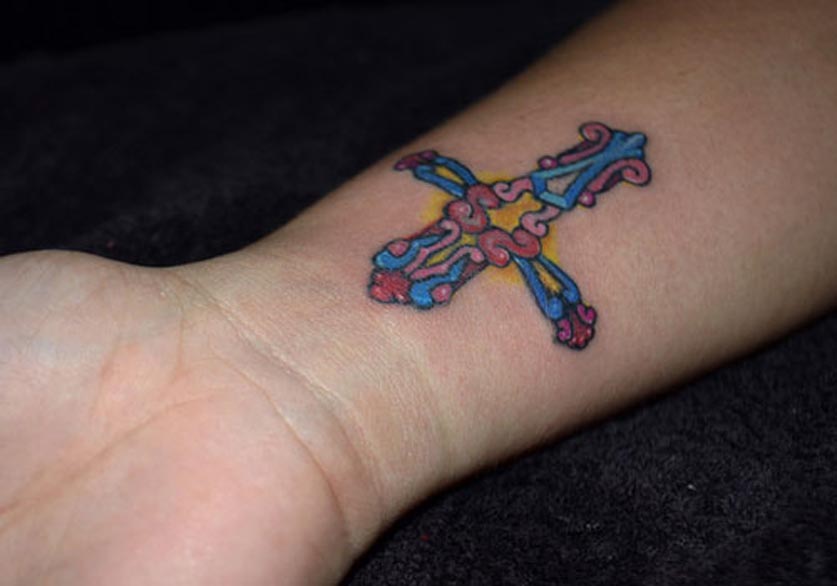 Amazing Watercolor Cross Tattoo On Wrist