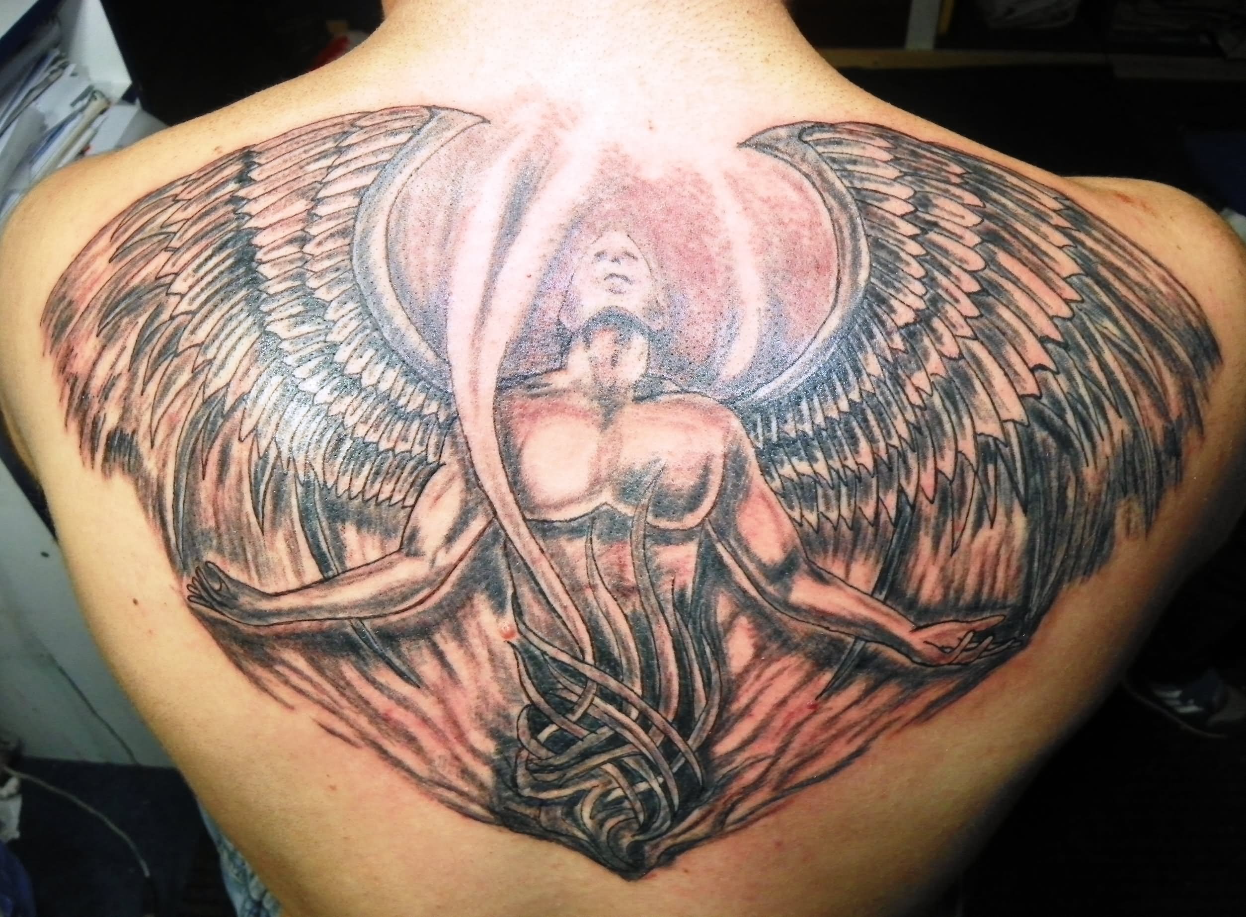 Angel Man Open Arm Tattoo On Back