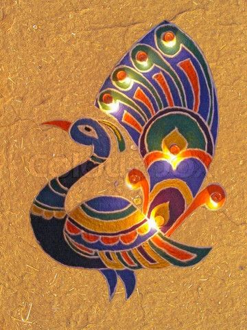 Awesome Peacock Rangoli Design With Diyas