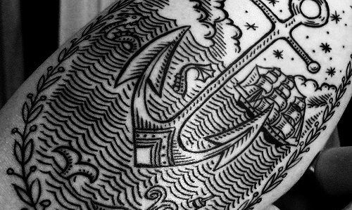 Black Anchor In Ocean Tattoo Design