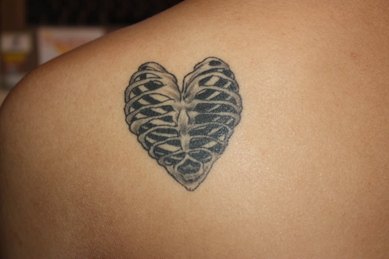 Black And Grey 3D Heart Rib Cage Tattoo On Left Back Shoulder