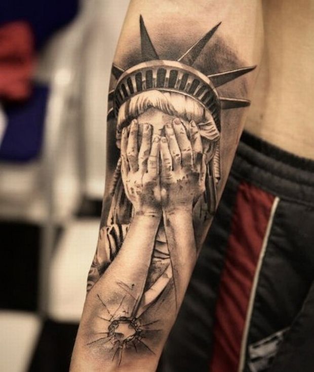 Black And Grey 3D Statue Of Liberty Hiding Face  Tattoo On Forearm