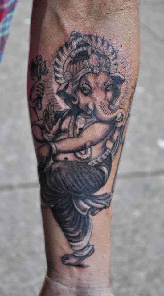 Black And Grey Dancing Ganesha Tattoo On Forearm