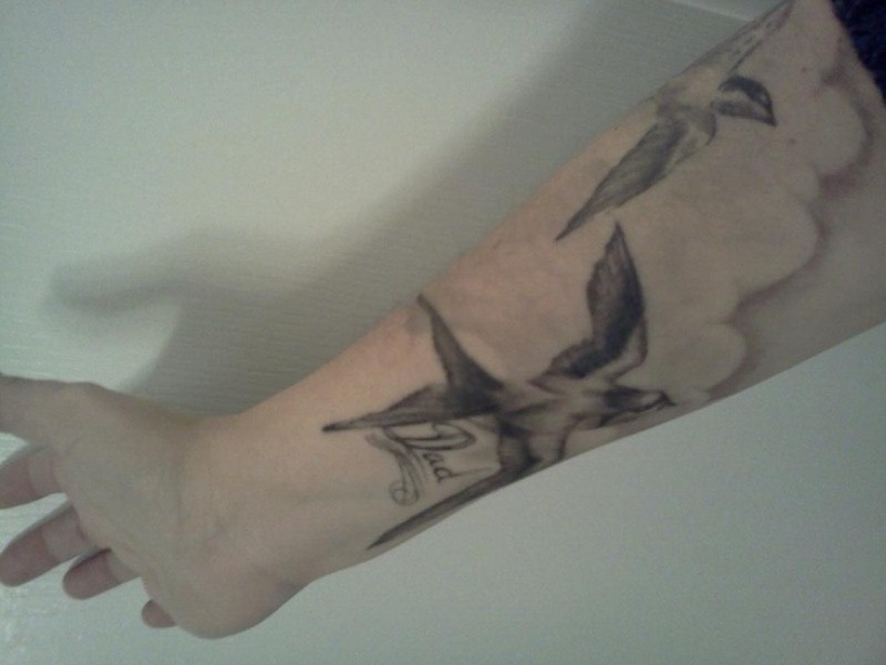 Black And Grey  Flying Swallow Tattoo On Forearm