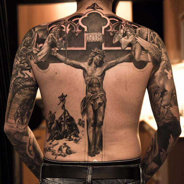 Black And Grey Crucified Jesus On Cross Tattoo On Man Back