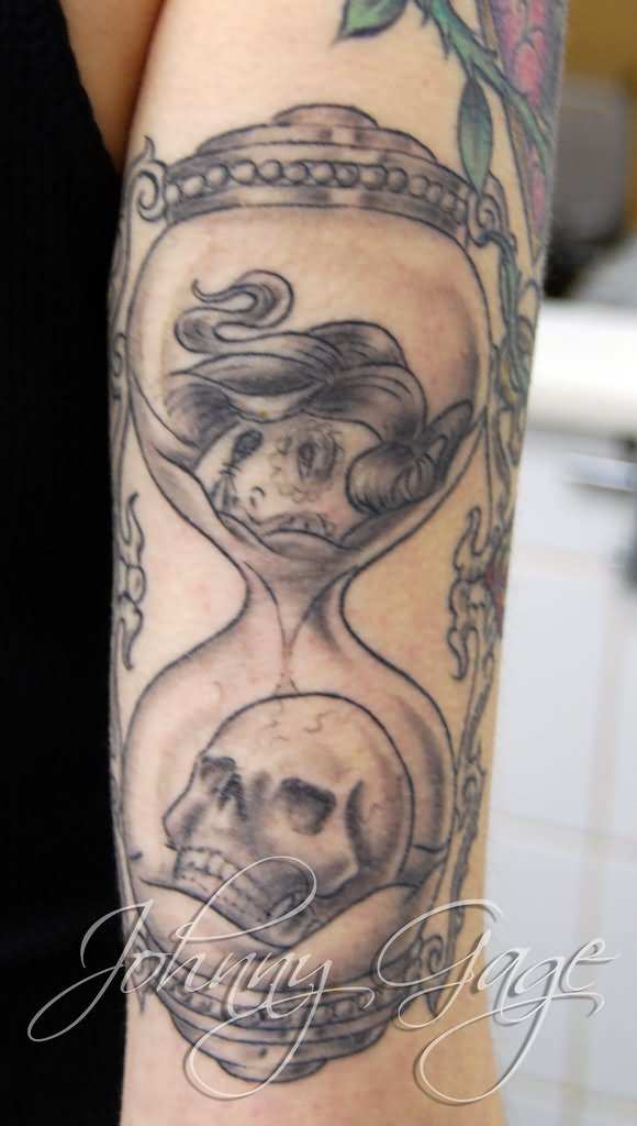 Black And Grey Skull In Hourglass Tattoo On Half Sleeve By Johnny Gage