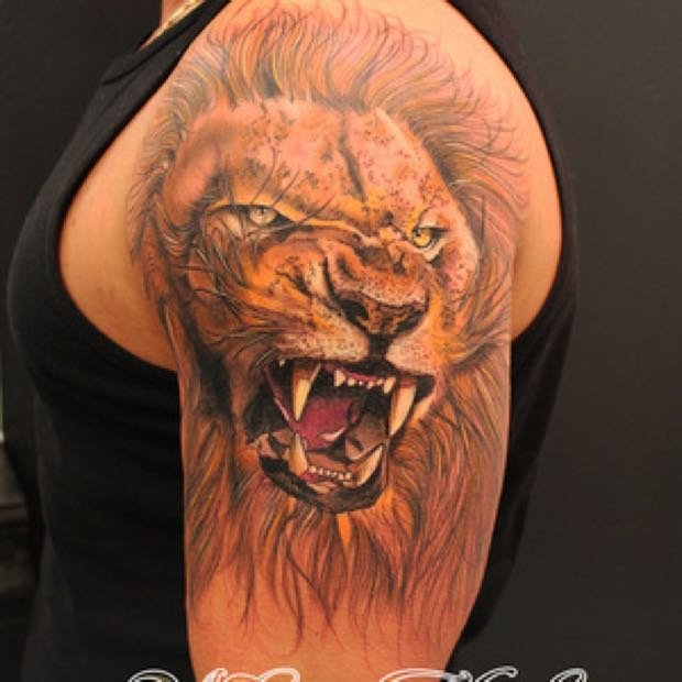 Black And Red Lion Tattoo On Half Sleeve