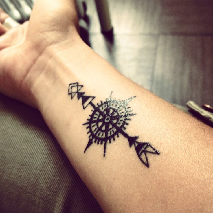 Black Arrow With Compass Tattoo On Forearm By Valeria