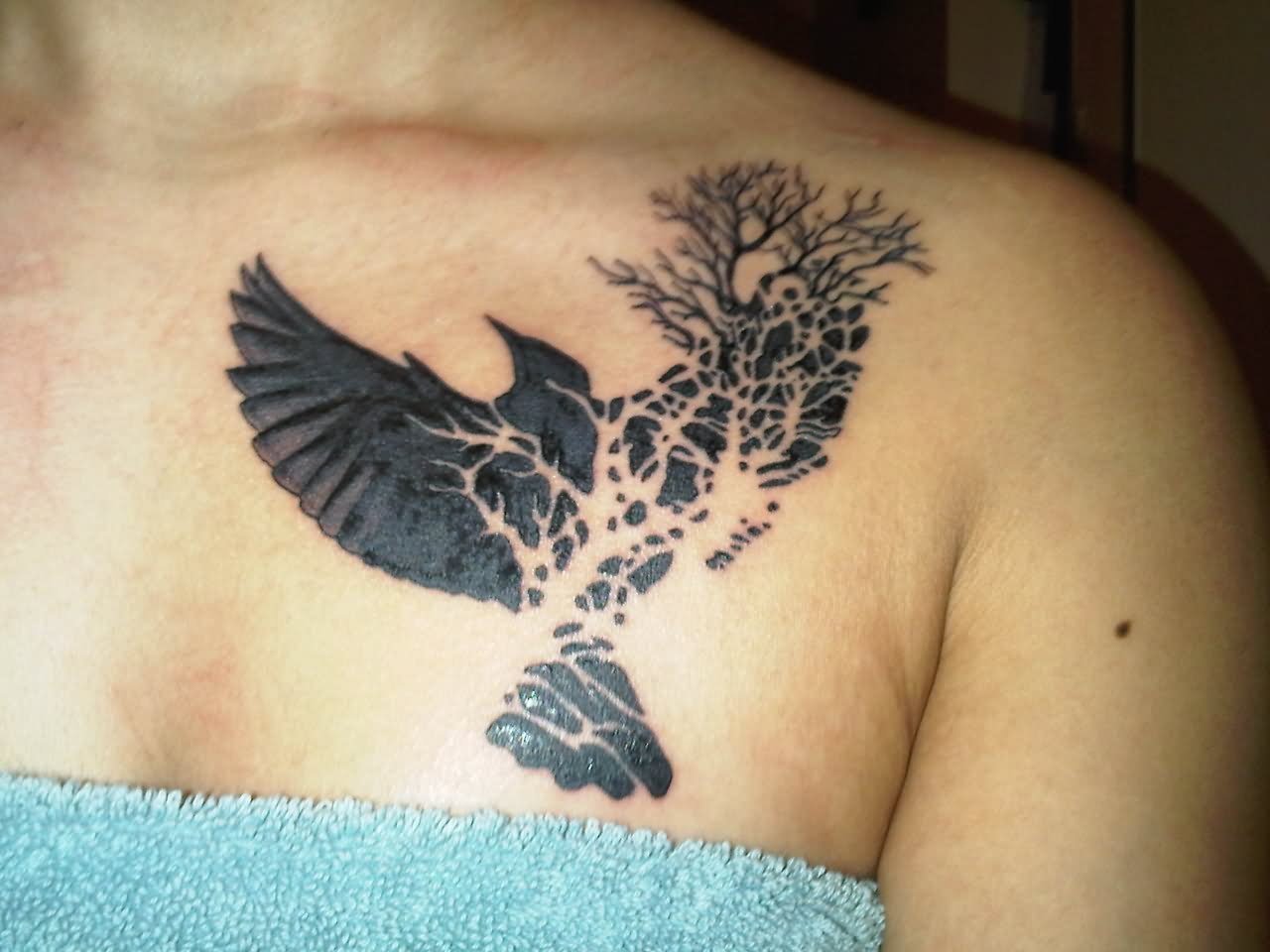 Black Bird Tattoo With Tree Tattoo On Front Shoulder