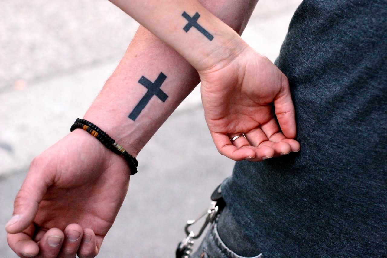 Black Cross Tattoo On Couple Wrist By Kris Krug
