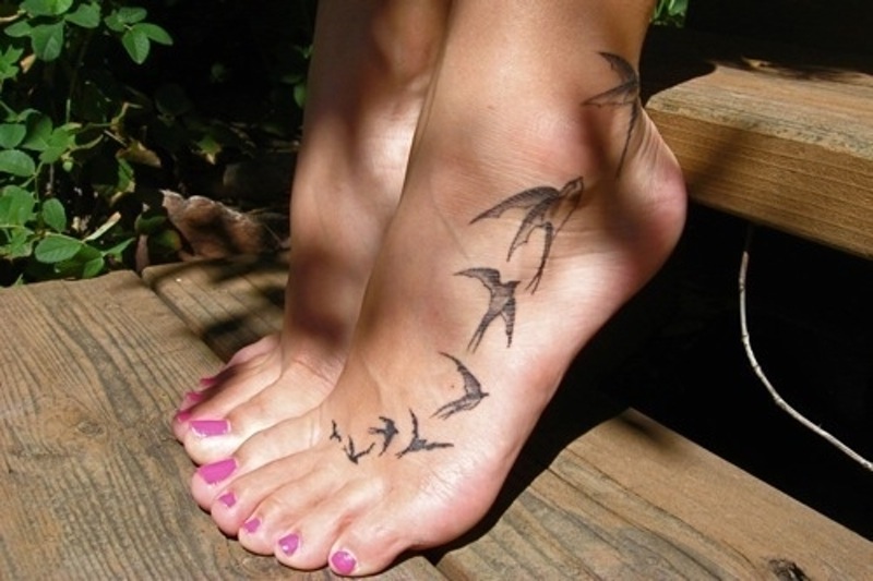 Black Flying Swallows Tattoo On Foot