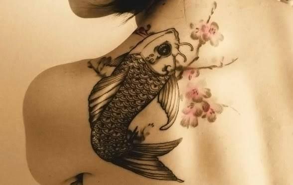 Black Ocean Fish Tattoo On Girl Back Shoulder