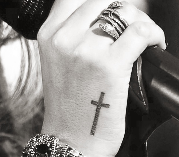 Black Simple Cross Tattoo On Girl Hand
