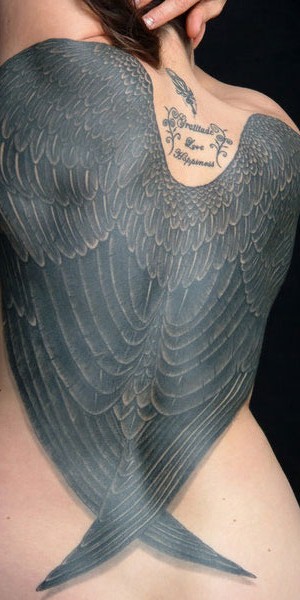 Black Swallow Wings Tattoo on Girl Back