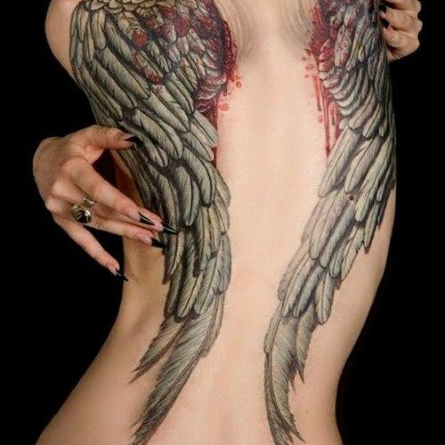 Bleeding Wings Tattoo On Girl Back