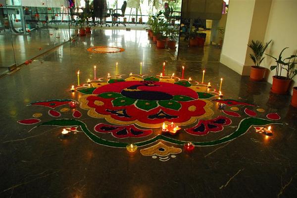 Candles And Rangoli Diwali Decoration At Home