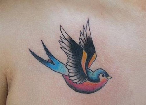 Colorful Flying Swallow Tattoo On Chest By Sellavision