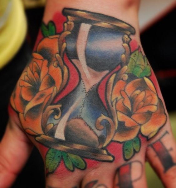 Colorful Hourglass With Roses Tattoo On Hand