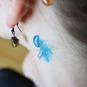 Colorful Ocean Jelly Fish Tattoo On Girl Behind The Ear