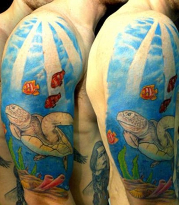 Colorful Turtle with Fishes In Ocean Tattoo On Man Half Sleeve