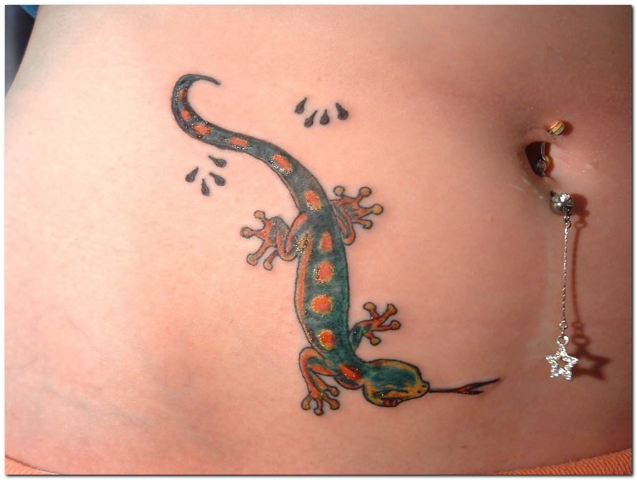Colorful lizard flicking tongue tattoo on hip