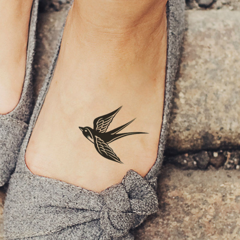 Cute Black Swallow Tattoo on Girl Foot