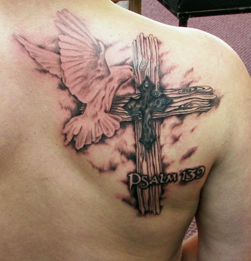 Flying Dove And Wooden Cross Tattoo On Man Right Back Shoulder By Mugsysmaster