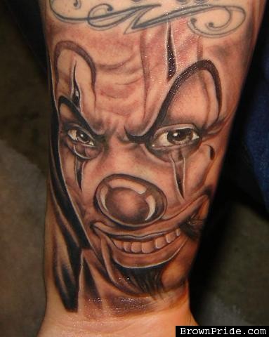 Grey Ink Gangster Clown Tattoo On Forearm