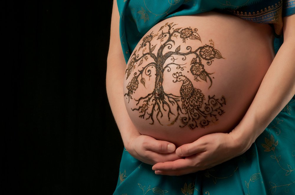 Henna Ornate Tree Tattoo On Pregnant Lady Stomach
