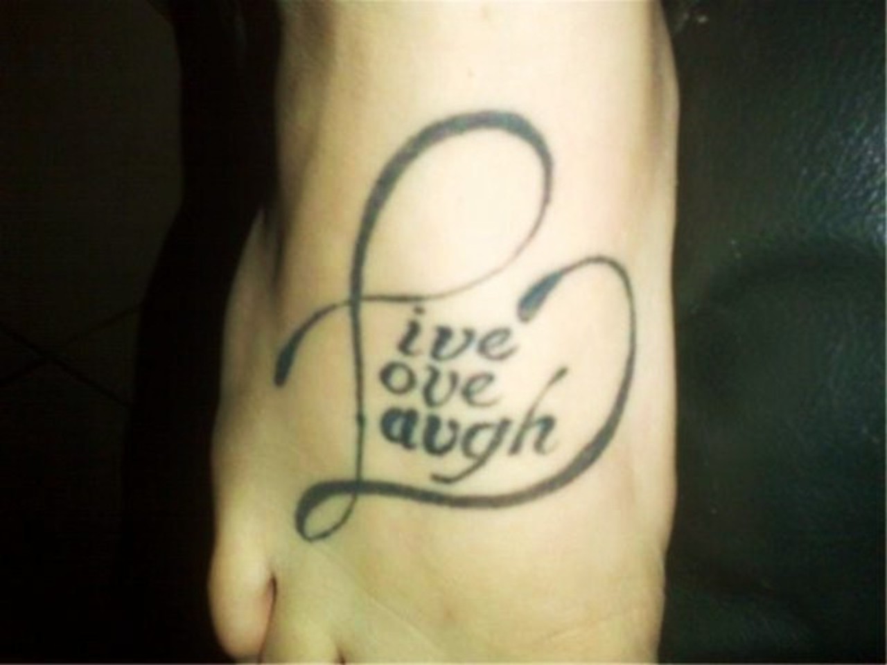 Live Laugh Love Tattoo On Right Foot